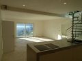 immobilie-tessin-attika-wohnzimmer-kueche-treppe_20130109_2033524764